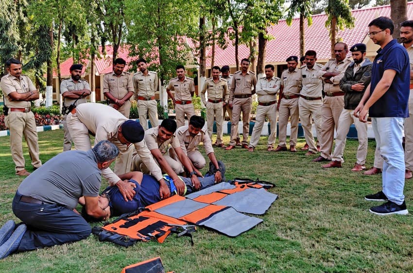 The Impact Of One Health On Conservation-Forest staff participate in a simulated safe extrication of an accident victim during a trauma management training session at the Gir National Park, Gujarat.