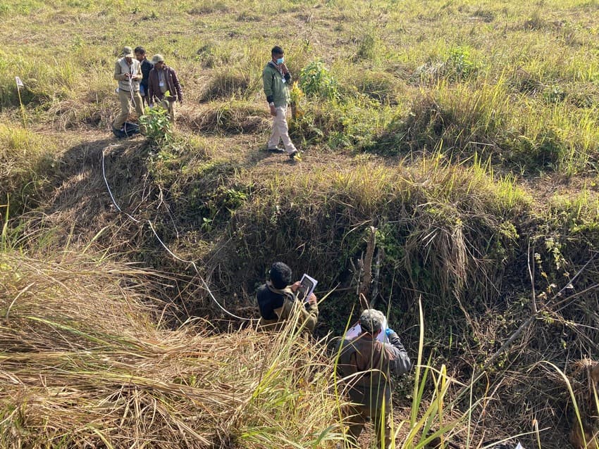 Forest staff investigating a mock crime scene as part of a wildlife crime investigation and forensics training programme conducted by WCT in Manas Tiger Reserve.