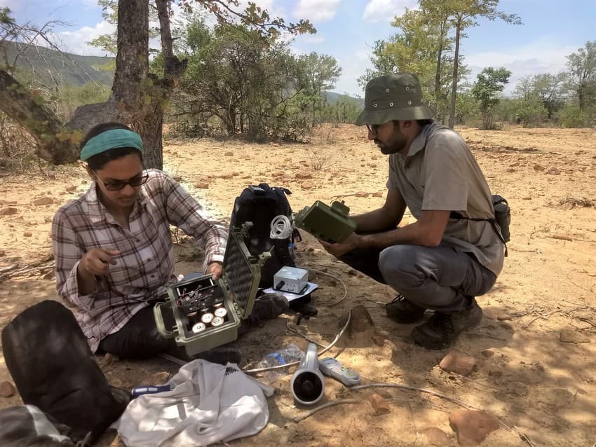 Chiti Arvind (left) along with a team member engaged in field deployment of recorders.