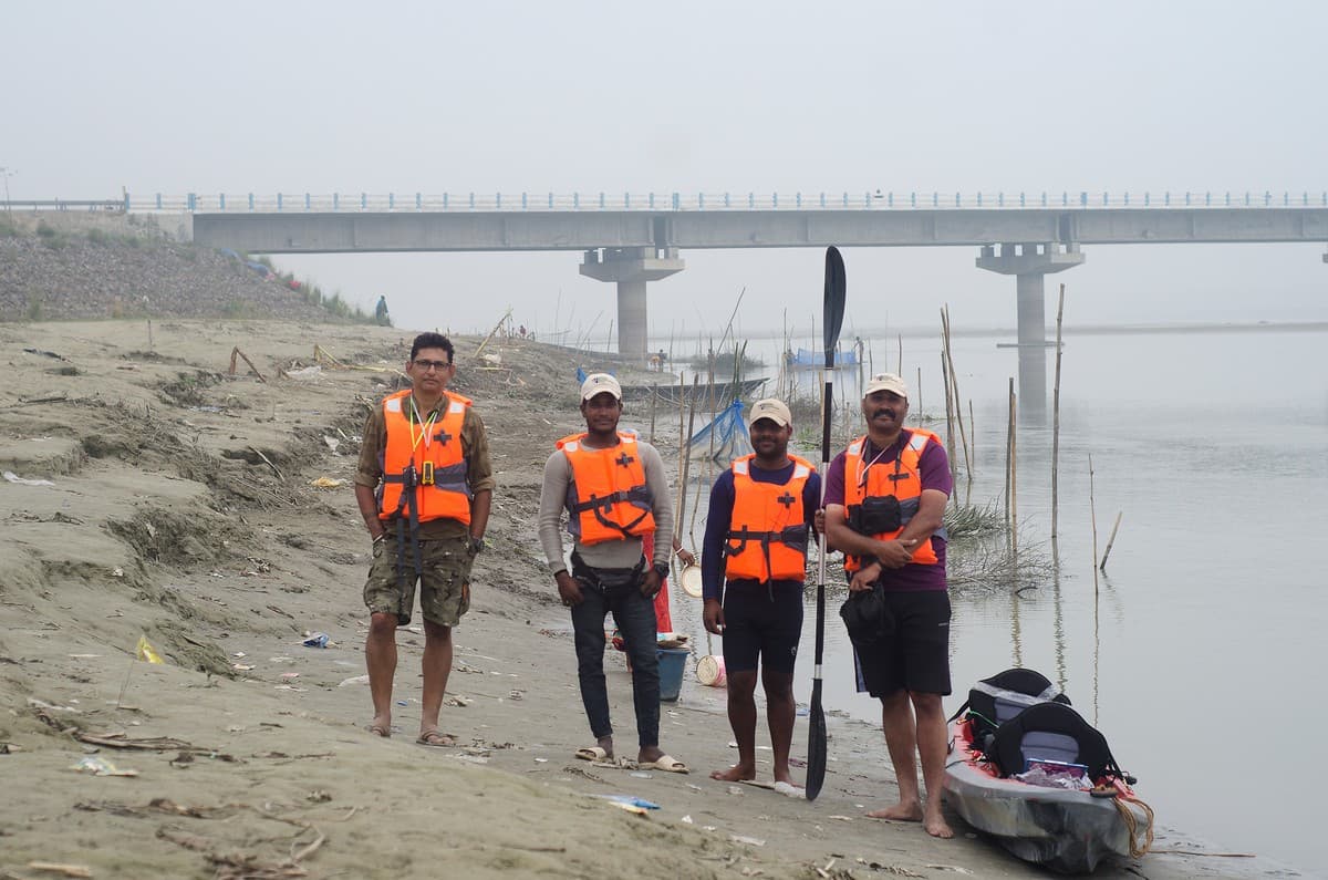 Dr. Kelkar and his team while conducting the survey of the Mahananda River.